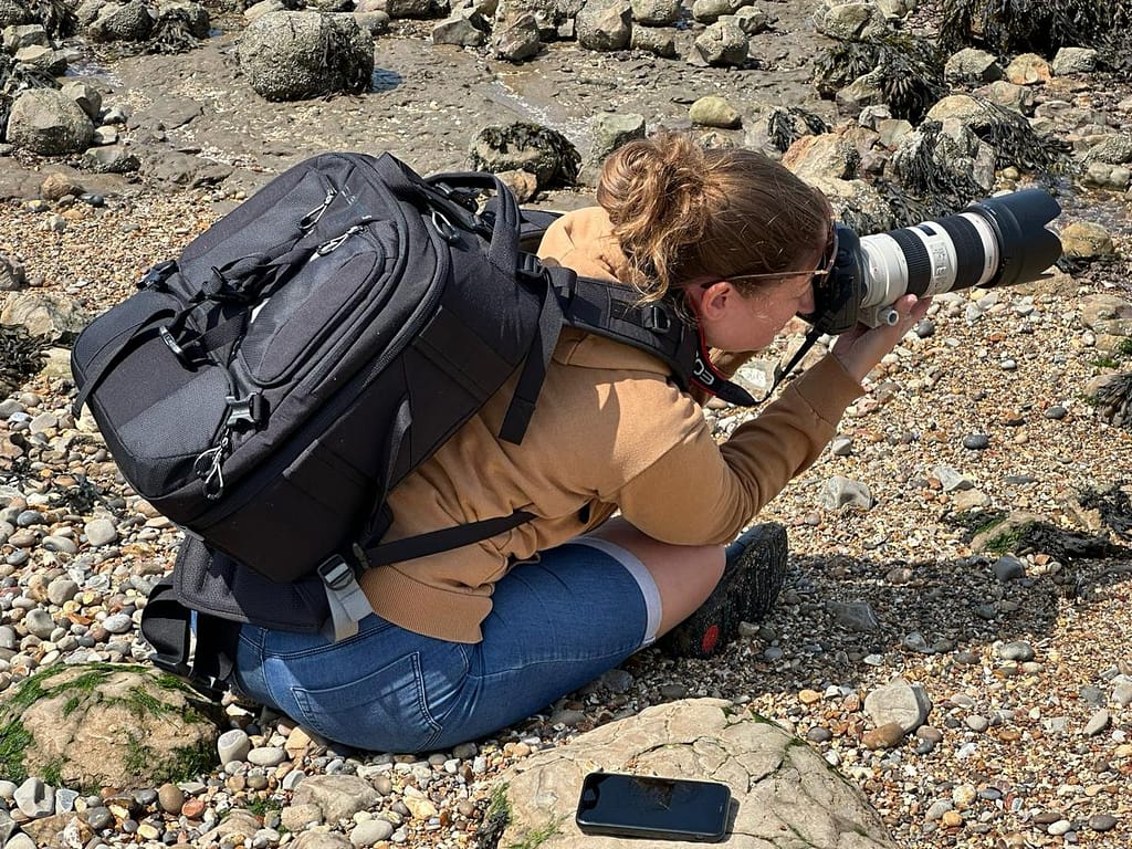 Maria taking photos at Warden Point Beach