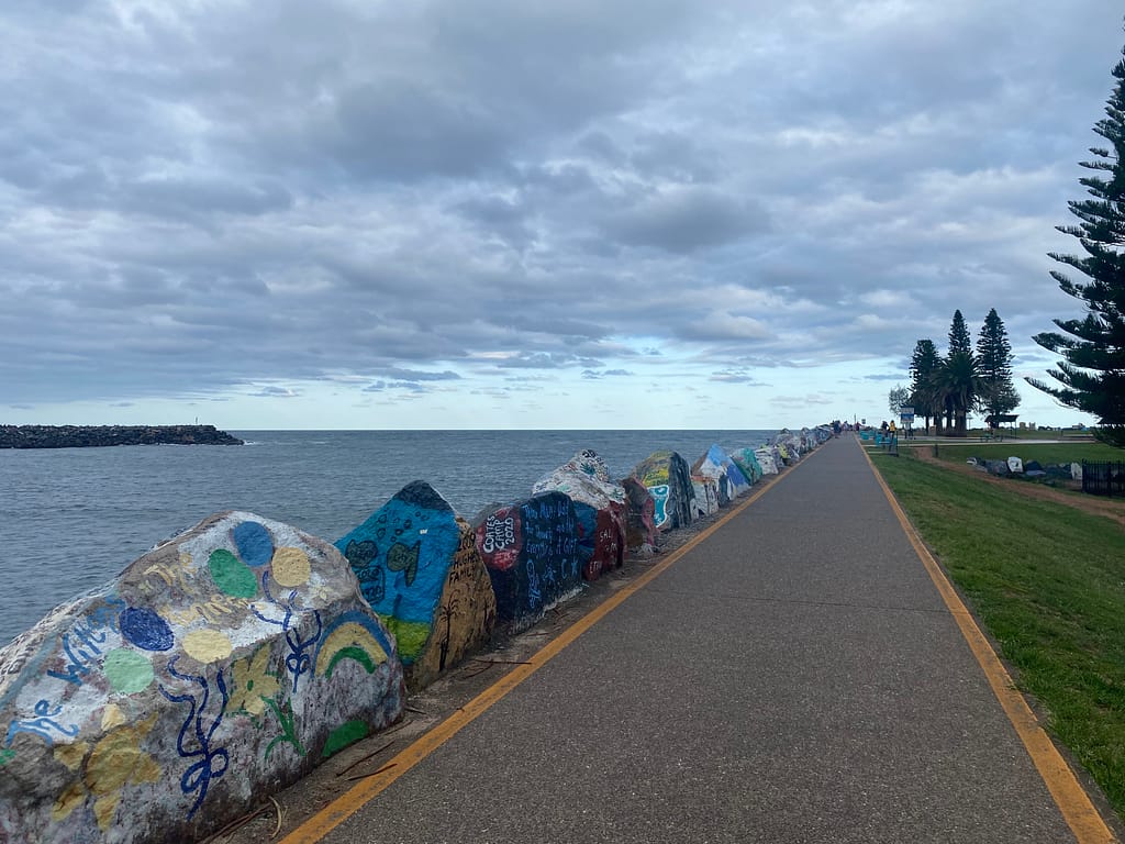 Port Macquarie's Coastal Walk lined with painted rocks