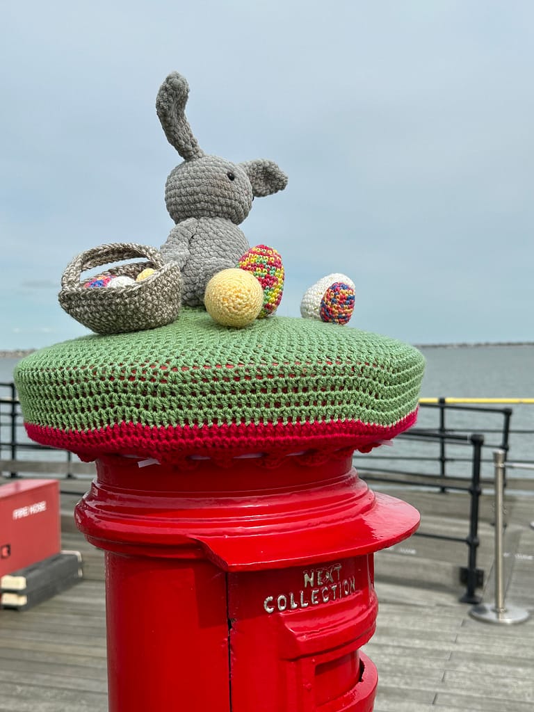 Southend Pier Red Post Box, with an Easter themed croquet topper on top