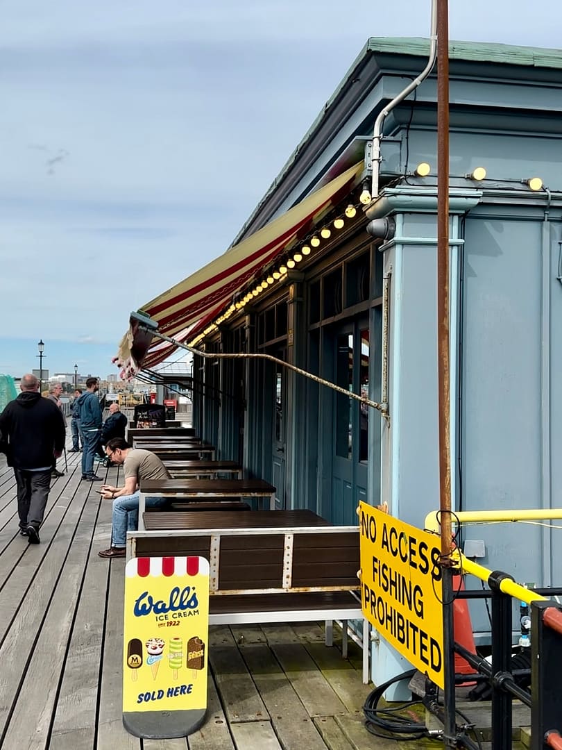 Tea with the Tide, with people walking past